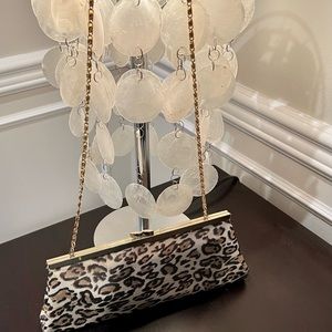 Leopard Bag with gold chain.